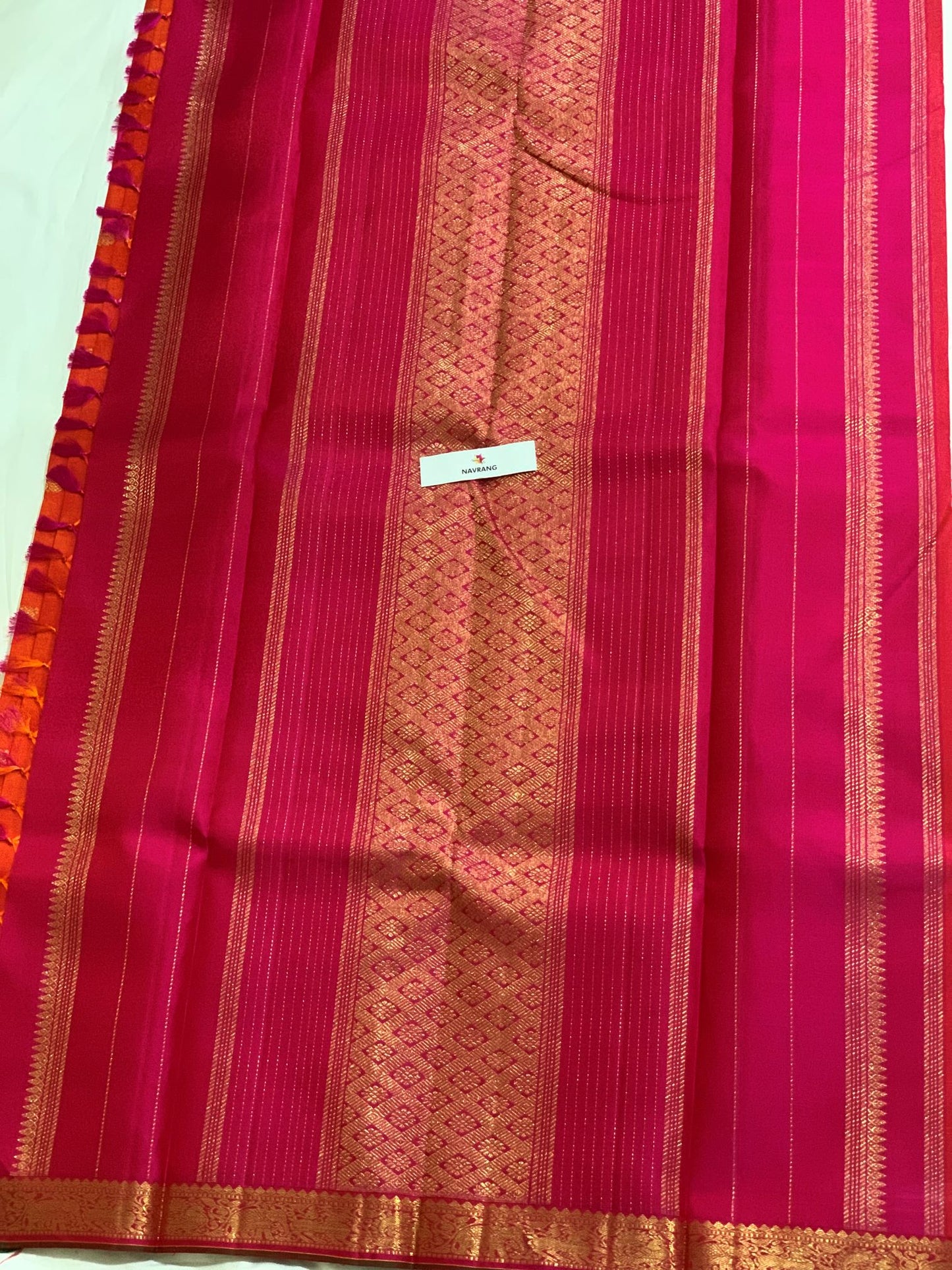 Orange and pink Kanjivaram saree with pure zari