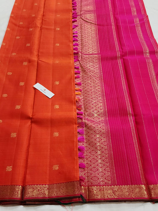 Orange and pink Kanjivaram saree with pure zari